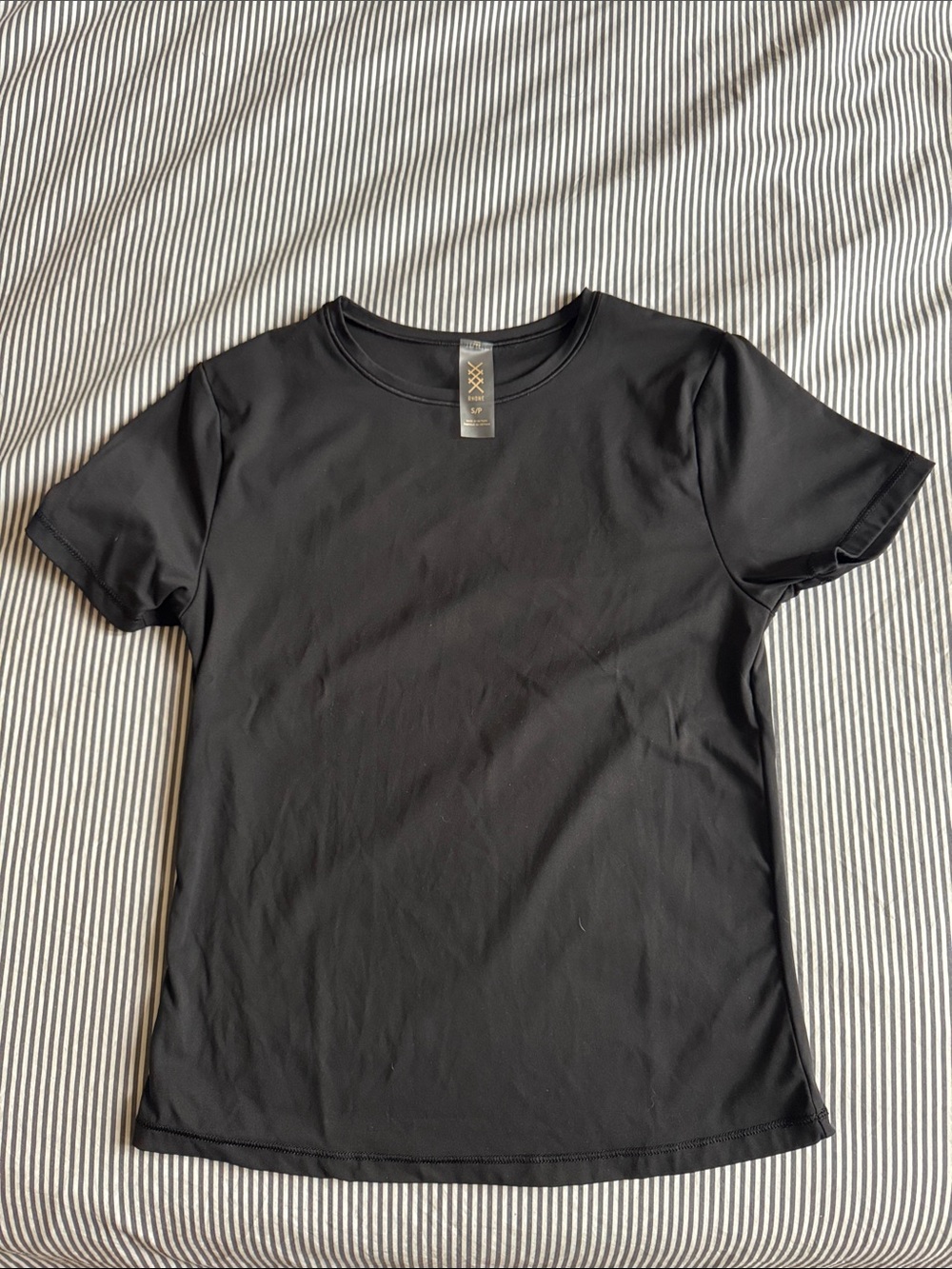 RHONE Black “Ultimate Layer” Tee
